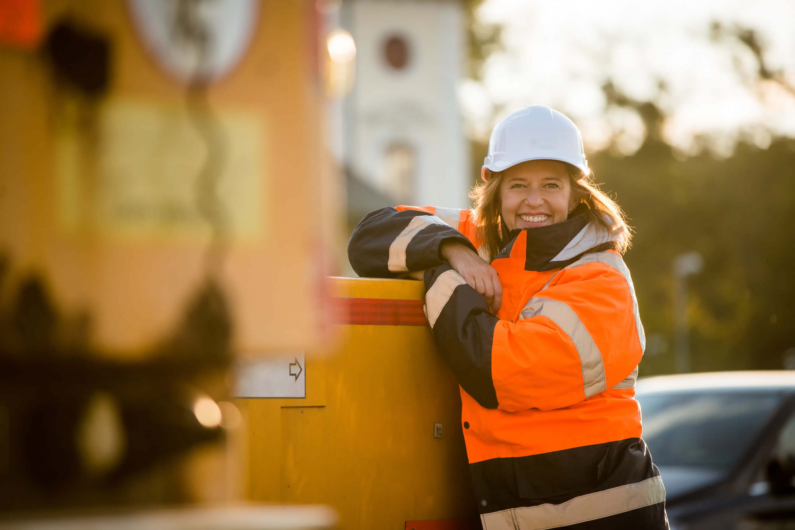 woman in safety clothes and hard hat