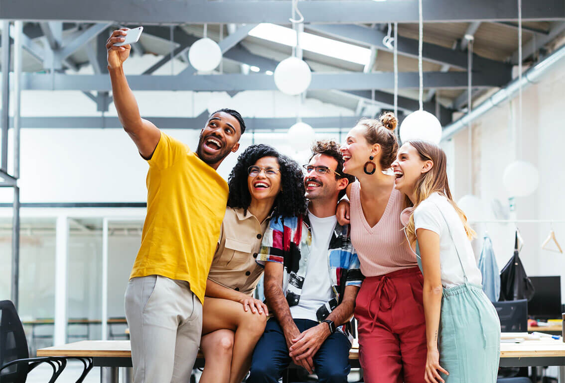 group of people taking selfie